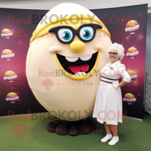 Cream Rugby Ball mascot costume character dressed with a Maxi Skirt and Eyeglasses