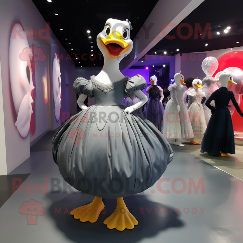 Gray Muscovy Duck mascot costume character dressed with a Ball Gown and Clutch bags