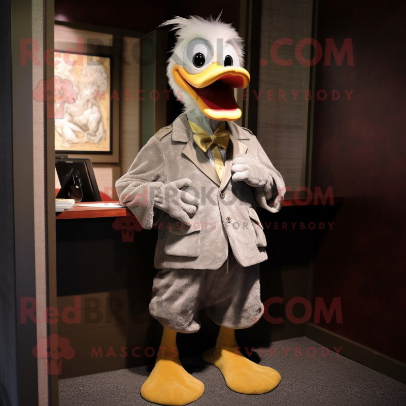 Silver Duck mascot costume character dressed with a Corduroy Pants and Cufflinks