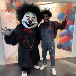 Black Evil Clown mascot costume character dressed with a Boyfriend Jeans and Scarves