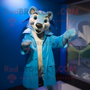 Sky Blue Thylacosmilus mascot costume character dressed with a Raincoat and Cufflinks