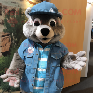 Blue Marmot mascot costume character dressed with a Denim Shirt and Gloves