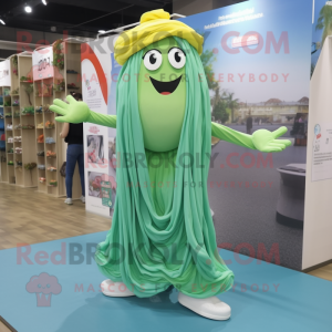 Cyan Pesto Pasta mascot costume character dressed with a Maxi Dress and Shoe laces