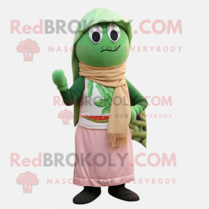 Peach Green Bean mascot costume character dressed with a Trousers and Scarves