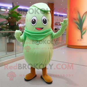 Peach Green Bean mascot costume character dressed with a Trousers and Scarves