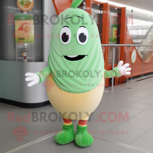 Peach Green Bean mascot costume character dressed with a Trousers and Scarves