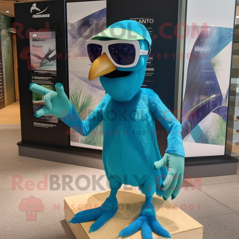 Cyan Archeopteryx mascot costume character dressed with a Polo Tee and Sunglasses Cyan Archeopteryx mascot costume character dressed with a Polo Tee and Sunglasses