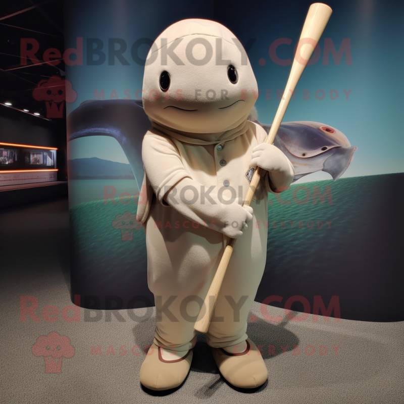 Tan Narwhal mascot costume character dressed with a Baseball Tee and Shawls