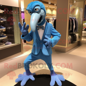 Blue Dodo Bird mascot costume character dressed with a Suit Pants and Shoe laces