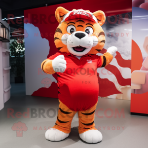 Red Tiger mascot costume character dressed with a Mini Dress and Caps