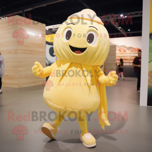 Beige Lemon mascot costume character dressed with a Skirt and Shoe laces