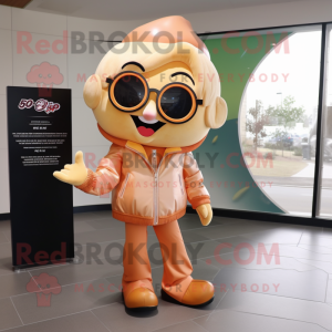 Peach Candy mascot costume character dressed with a Leather Jacket and Reading glasses