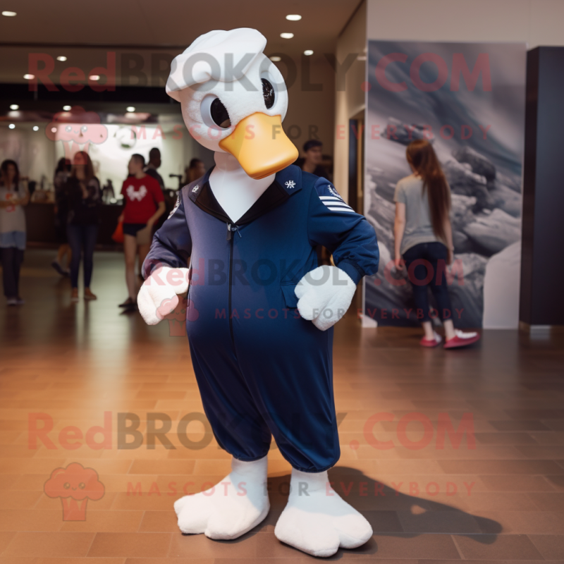 Navy Swan mascot costume character dressed with a Jumpsuit and Backpacks