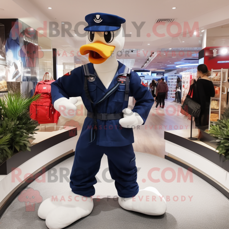 Navy Swan mascot costume character dressed with a Jumpsuit and Backpacks