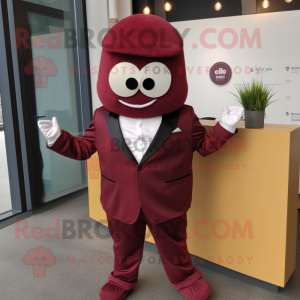 Maroon Falafel mascot costume character dressed with a Suit Jacket and Berets