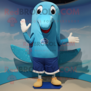 Blue Humpback Whale mascot costume character dressed with a Board Shorts and Mittens