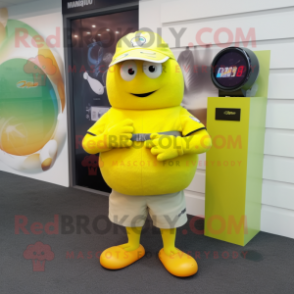 Lemon Yellow Kiwi mascot costume character dressed with a Cargo Shorts and Smartwatches