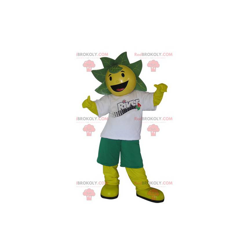 Mascotte de bonhomme jaune et vert avec des feuilles sur la