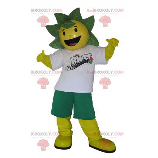 Mascotte de bonhomme jaune et vert avec des feuilles sur la