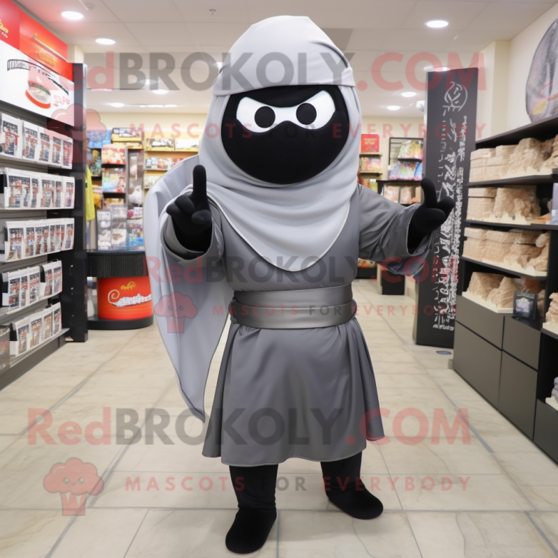 Gray Ninja mascot costume character dressed with a A-Line Skirt and Clutch bags