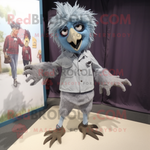 Gray Harpy mascot costume character dressed with a Chambray Shirt and Shoe clips