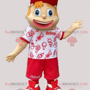 Mascot joven en traje de vacacionista rojo y blanco -
