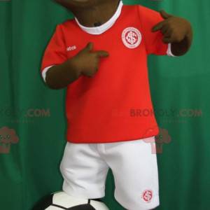 Young African boy mascot in footballer outfit - Redbrokoly.com