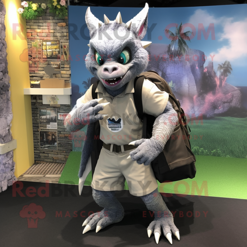 Silver Gargoyle mascot costume character dressed with a Bermuda Shorts and Backpacks