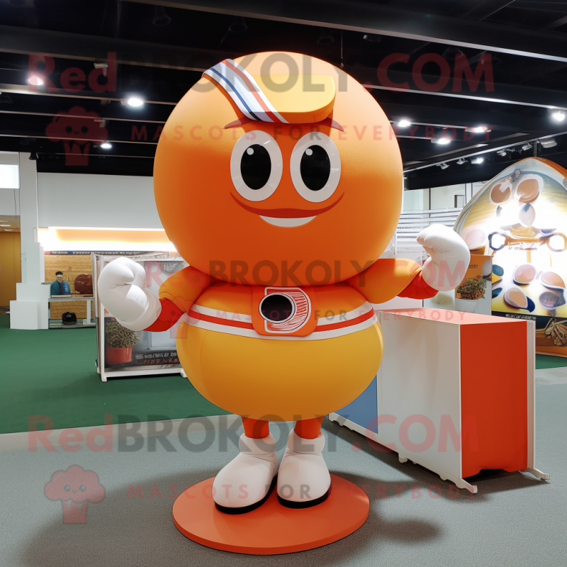 Peach Human Cannon Ball mascot costume character dressed with a T-Shirt and Rings