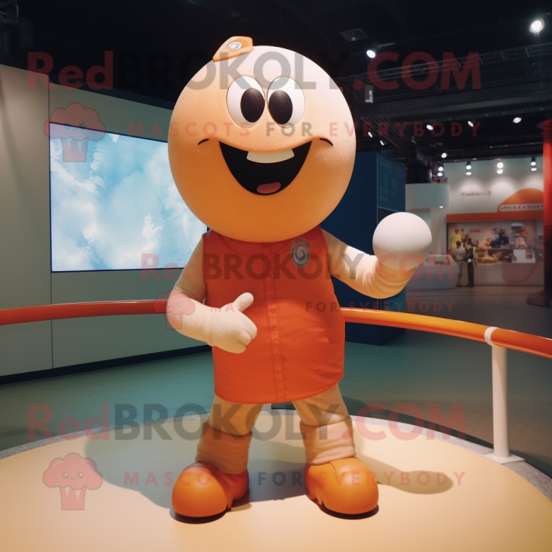 Peach Human Cannon Ball mascot costume character dressed with a T-Shirt and Rings