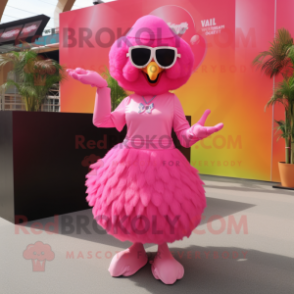 Pink Butter Chicken mascot costume character dressed with a Ball Gown and Sunglasses