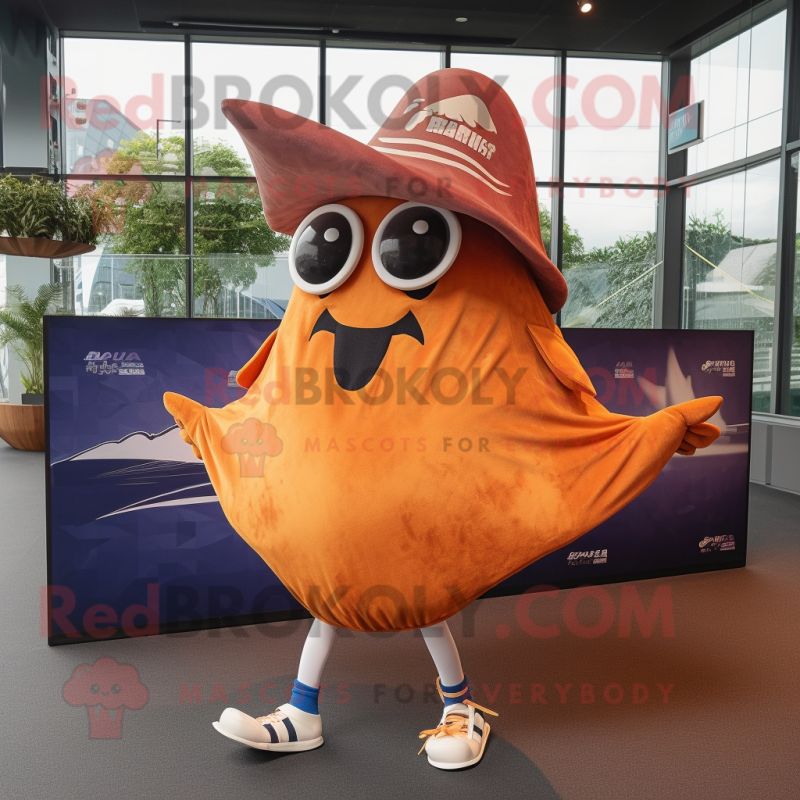 Rust Manta Ray mascot costume character dressed with a Running Shorts and Berets