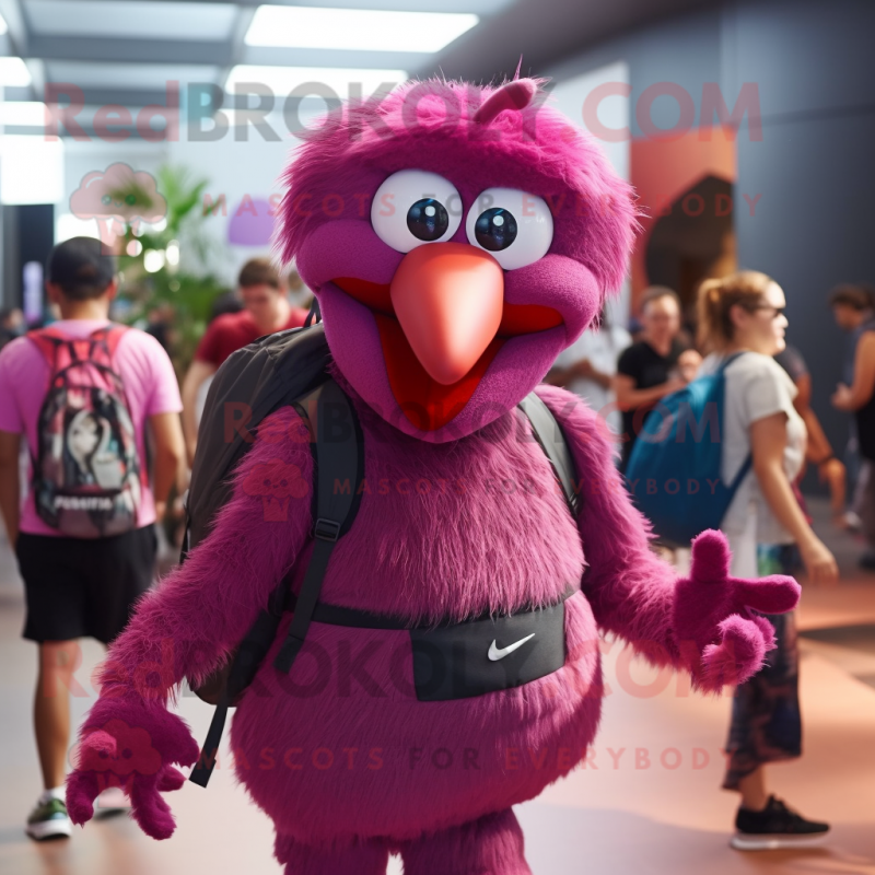 Magenta Ostrich mascot costume character dressed with a Shorts and Backpacks