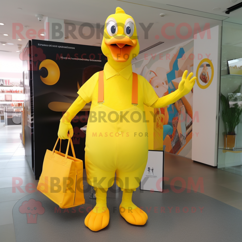 Lemon Yellow Geese mascot costume character dressed with a V-Neck Tee and Tote bags Lemon Yellow Geese mascot costume character dressed with a V-Neck Tee and Tote bags