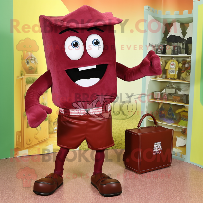 Maroon Candy Box mascot costume character dressed with a Capri Pants and Clutch bags Maroon Candy Box mascot costume character dressed with a Capri Pants and Clutch bags