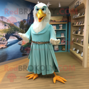Turquoise Seagull mascot costume character dressed with a Maxi Dress and Ties