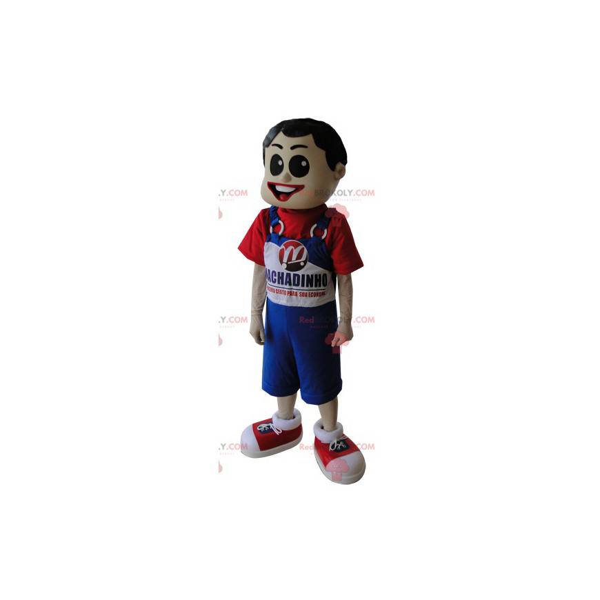 Menino mascote de macacão azul e camiseta vermelha -