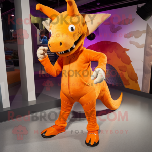 Orange Triceratops mascot costume character dressed with a Jeggings and Shoe laces