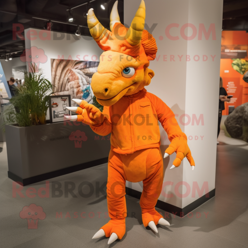 Orange Triceratops mascot costume character dressed with a Jeggings and Shoe laces