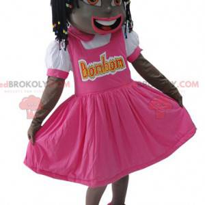 Maskot liten klädd afrikansk flicka i rosa färg - Redbrokoly.com
