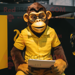 Gold Chimpanzee mascot costume character dressed with a Oxford Shirt and Eyeglasses