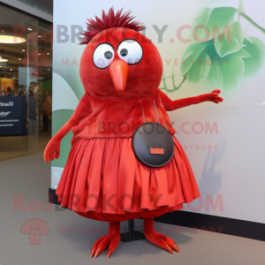 Red Kiwi mascot costume character dressed with a Pleated Skirt and Wallets