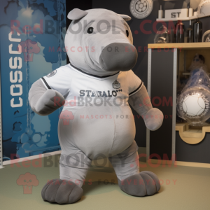 Gray Stellar'S Sea Cow mascot costume character dressed with a Rugby Shirt and Shoe clips