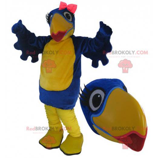 Mascote grande pássaro azul e amarelo com batom - Redbrokoly.com