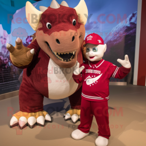 Maroon Triceratops mascot costume character dressed with a Henley Tee and Mittens