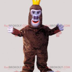 Mascotte de singe gorille marron avec une couronne -