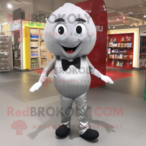 Silver Shakshuka mascot costume character dressed with a Jeggings and Bow ties