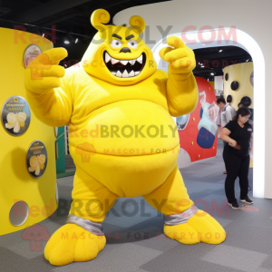 Lemon Yellow Ogre mascot costume character dressed with a Capri Pants and Rings