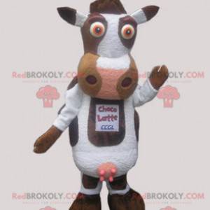 Mascota linda vaca blanca y marrón - Redbrokoly.com