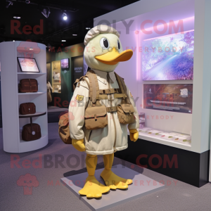 Tan Duck mascot costume character dressed with a Bodysuit and Messenger bags